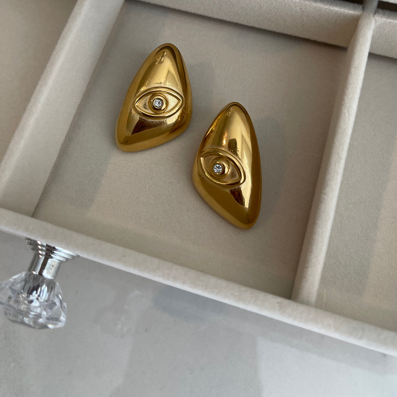 Gold stud earrings